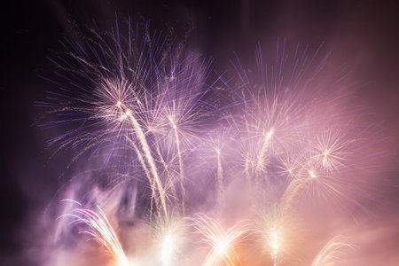 Spectacular fireworks show light up the sky. New year celebration background
