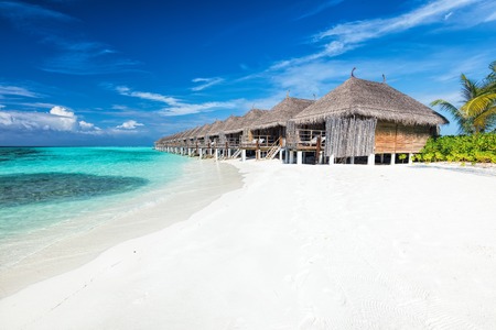 Beach and water villas on a small island resort in Maldives, Indian Ocean. Holidays destinationの写真素材