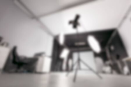Photo studio with lighting equipment. Blur background.の写真素材