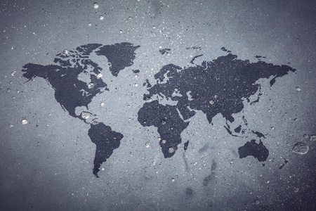 World map on grey concrete background. Continents and lands. Geography.の写真素材