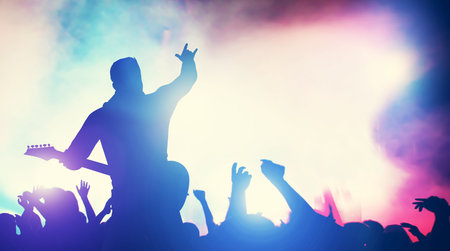 Man playing guitar at the stage, crowd cheering. Concert, music gig. Audience, fans, fame,...