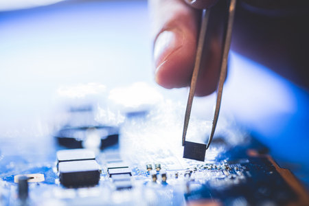 Microchip installation on CPU board. Professional IT service. Modern technologies and engineering.