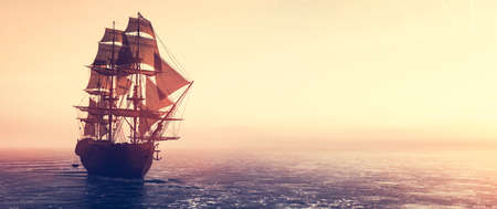 Pirate ship sailing on the ocean at sunset. Vintage cruiseの写真素材