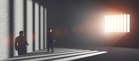 Businessman in jail looking at light coming from behind prison bars. Concept of economic offense,...