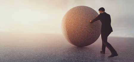 Businessman pushing heavy rock. Concept of difficult task, effort and struggle. 3D illustrationの写真素材