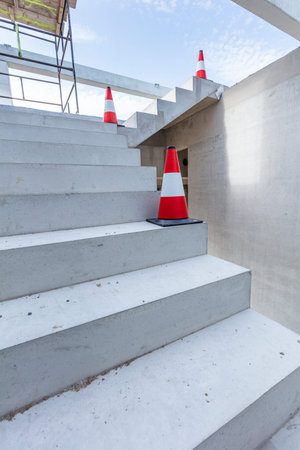 Warehouse stairs construction. Building a new industrial hall or storehouse