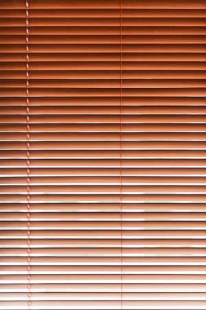 Wooden blinds on window backgroundの写真素材