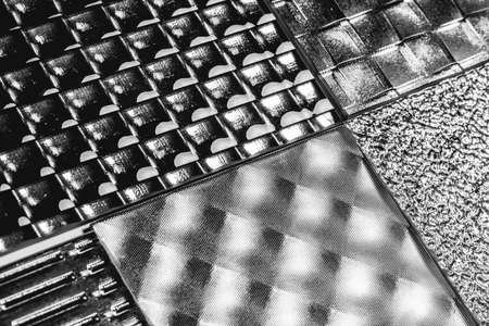 Decorative glass plates background. Black glassy decor close-upの写真素材