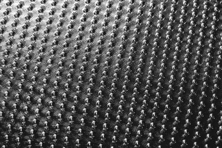 Decorative glass plate background. Black glassy decor close-upの写真素材