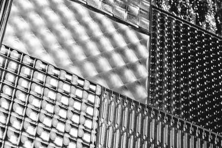 Decorative glass plates background. Black glassy decor close-upの写真素材