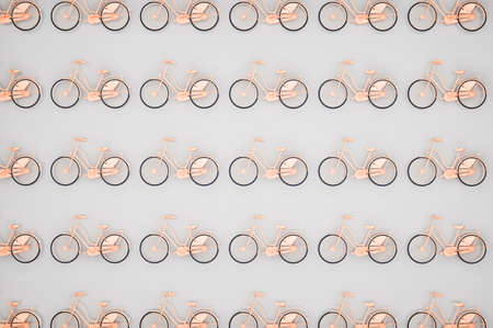 Pink bicycle background. Many bikes in a row, flat lay on white. 3D illustrationの写真素材