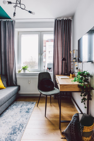 Interior of small apartment living room for home office. Real estate rent and home stagingの写真素材