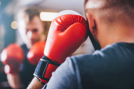 Boxers do boxing training on a gym, sparring and fighting