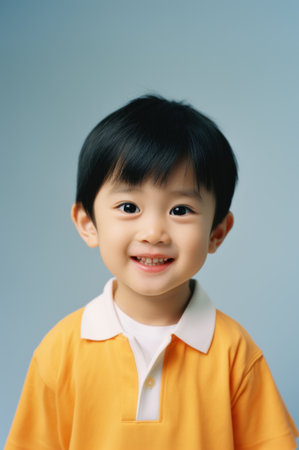 Young asian boy smiling, a child portrait.の素材