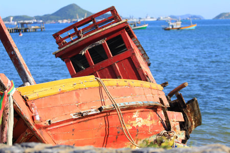 Old fishing boat on beachの写真素材