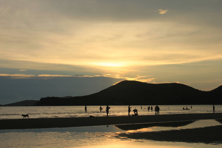 sunset on beach in pattaya thailandの写真素材