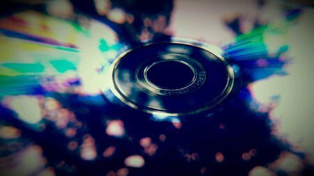 Macro close up of a dvd rom surface with reflectionsの素材