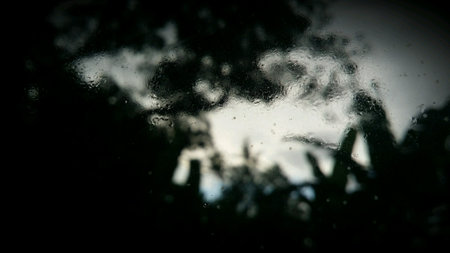 Close up of a steamy window glass with moisture and vapor