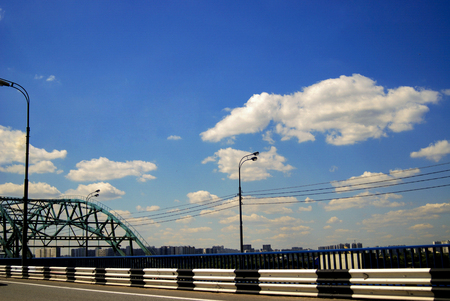 View of beautiful road and bridge, blue skyの写真素材