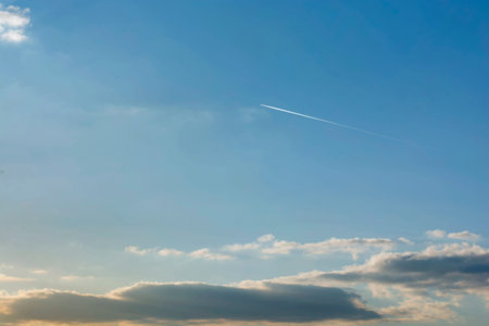 Beautiful view of blue sky and trace of the plane