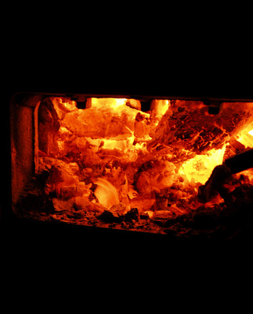 Wood burning oven, red hot flameの写真素材