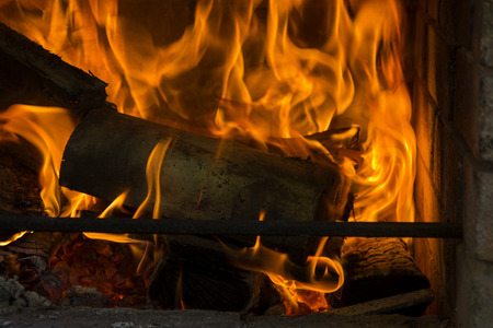 Beautiful view of fire close, logs and coalsの写真素材