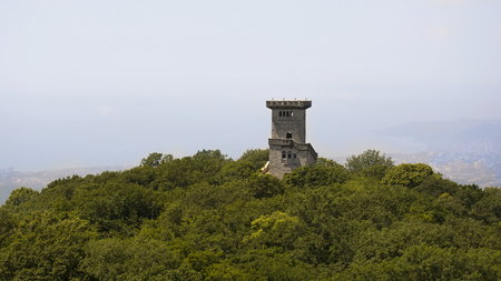 Beautiful view of small fort, trees and mountainsの写真素材