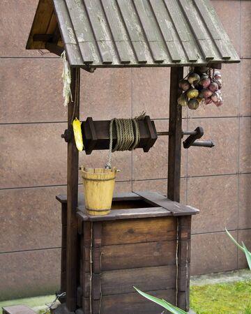Beautiful view of old wooden wellの写真素材