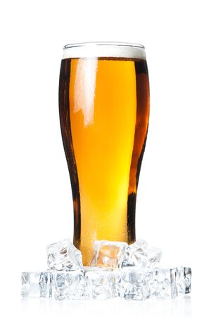 Wet glass of beer, surrounded by ice cubesの写真素材