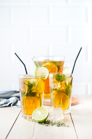 Cold tea with lime and mintの写真素材