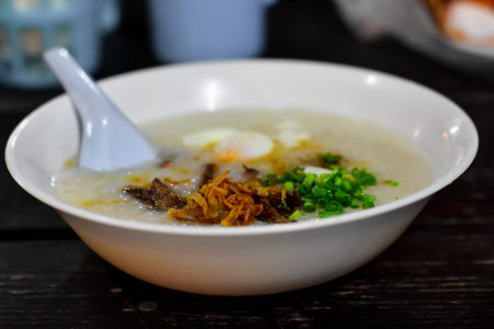 Boiled rice in a bowl with delicious coriander, delicious to eat early in the morning.