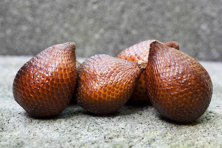 fruit Salacca zalacca wallichiana brick backgroundの写真素材