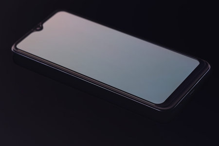 The modern smartphone with a frameless screen and a Waterdrop Notch camera.の写真素材
