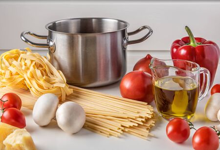Ingredients for cooking Italian food on a white background. の写真素材