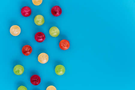 Still life of colorful spherical candies. Flat lay.の写真素材