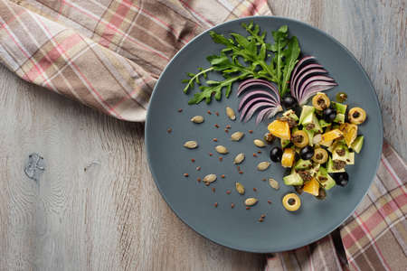 The salad of vegetables and fruits is originally decorated.の写真素材