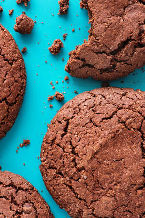 Americano cookies on a turquoise background. Flat lei. Top view.の写真素材