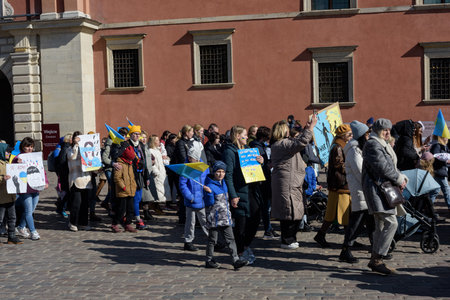 Warsaw. Poland. Castle Square. 03.18.2022. Anti-war rally of Ukrainian women whose husbands remained in Ukraine.のeditorial素材