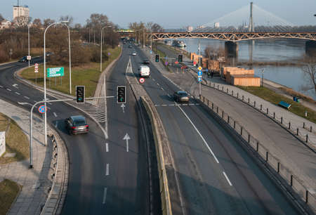 Warsaw. Poland. 03.30.2022. Road junction on the background of bridge.のeditorial素材