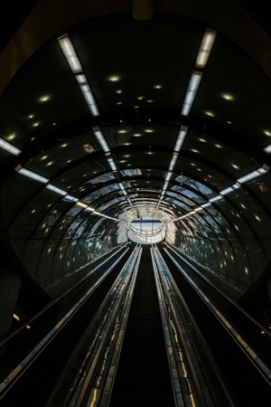 Exit to the escalator in the subway. Bottom-up view.の写真素材