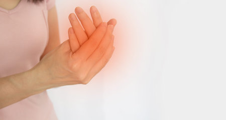 A women are rubbing hand with pain syndrome and feel numb