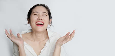 Asian Beautiful woman are very happy with smile and laugh to cerebrate a success in her life.の写真素材