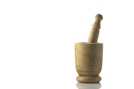 Light Brown Wooden Mortar and Pestle on White Background.の写真素材