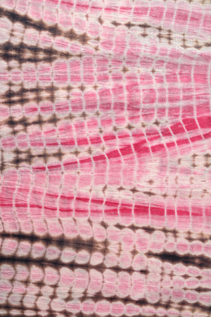 Background of  Red, Black,and Pink Tie and Dye Cloth Series.の写真素材