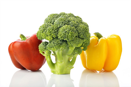Fresh Green Broccoli with Red and Yellow Bell Pepper Isolated on White Backgroundの写真素材