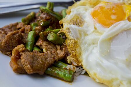 delicious thai fastfood,come with chilli pork,rice and fried eggの写真素材