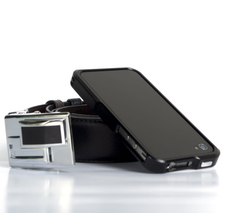 mobile phone stand on black spiral belt