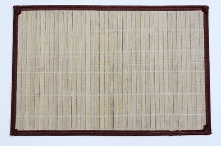 Bamboo mat isolated on white backgroundの写真素材