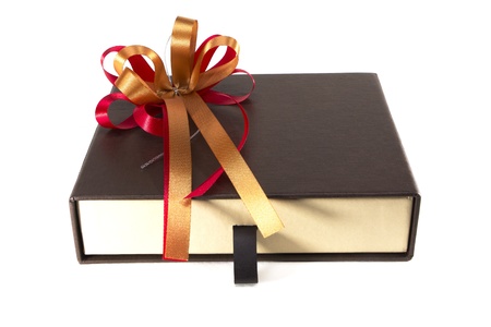 Beautiful gift box with overwhelming ribbon isolated on white backgroundの写真素材