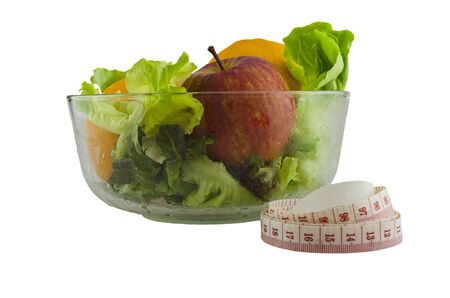 fresh salad and tape measure,isolated on white:Concept for healthy lifestyleの写真素材